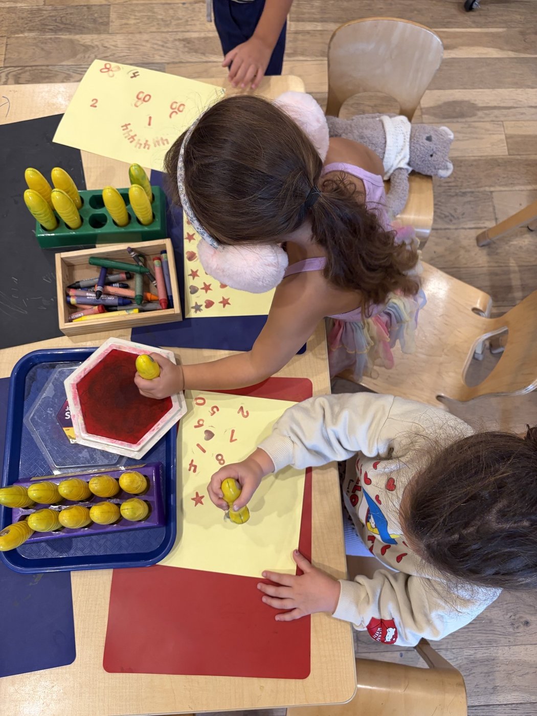 Block-building area with wooden construction toys